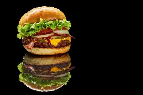 Hamburger with reflection on black background Stock Photos