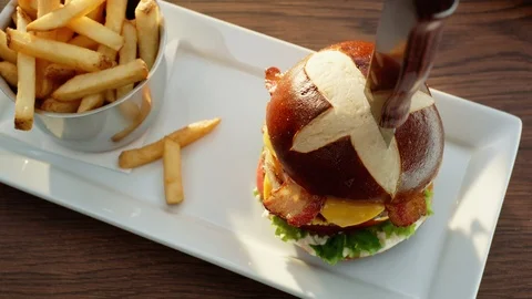 Hamburger Stabbed Stock Footage 121362579