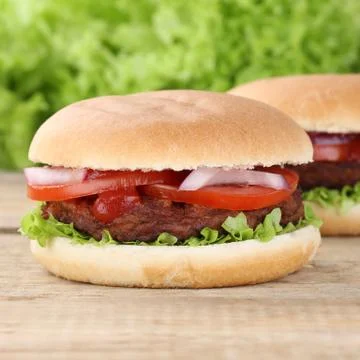 Hamburger with tomatoes Stock Photos