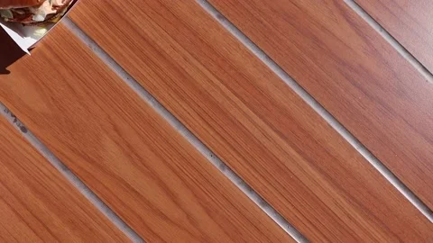 Hamburger, top view. Hands moving a hamburger Stock Footage 204746578