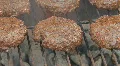 Hamburgers on Grill Clip 2 HD Footage