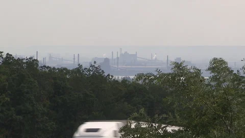 Hamilton, Ont, Canada Aug 22 2025 Smog and carbon emissions from steel factory Stock Footage 317966197