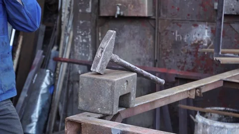 A hammer and an anvil in the smithy Stock Footage 101948732
