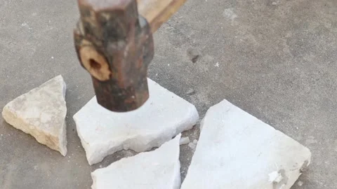 Hammer and beating on limestone in workshop Stock Footage 144091349
