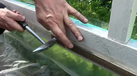 Hammer and nail Stock Footage 24696896