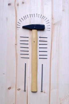 Hammer and Nails Flat Lay Still Life on Wood Фото
