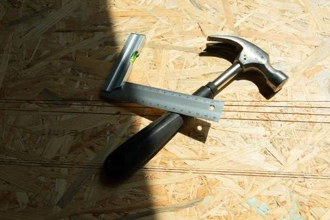 Hammer and precision try square Stock Photos