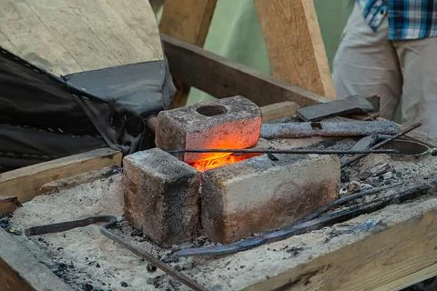 Hammer in the blacksmith's forge close-up, heating up the metal Foto stock