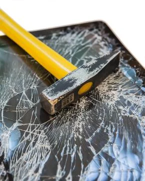 Hammer on the broken display Stock Photos