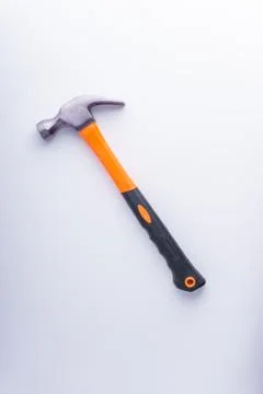 Hammer closeup on white background with selective focus and crop fragment 库存照片