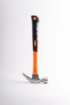 Hammer closeup on white background with selective focus and crop fragment 库存照片