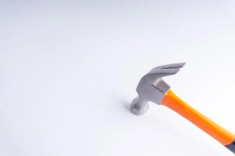 Hammer closeup on white background with selective focus and crop fragment Stock Photos