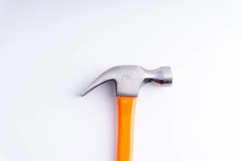 Hammer closeup on white background with selective focus and crop fragment Fotos Stock