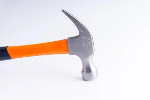 Hammer closeup on white background with selective focus and crop fragment 库存照片