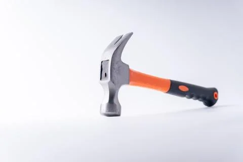 Hammer closeup on white background with selective focus and crop fragment Stock Photos