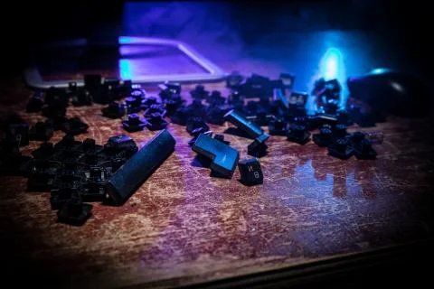 Hammer on computer keyboard with damaged keys Stock Photos