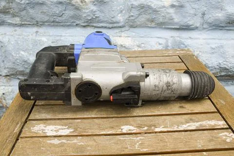 Hammer Drill Power Tool Close Up on Construction Site Stockfoto's