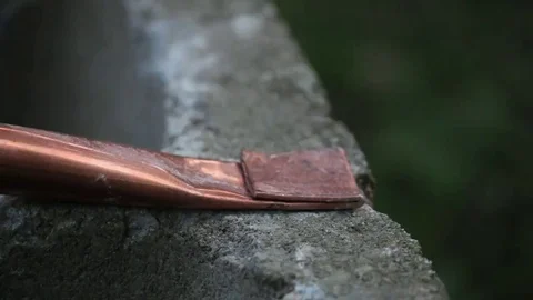 Hammer Flattening Copper Pipe Closeup Stock Footage 69143381