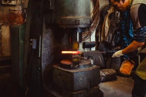 Hammer in the forge Stock Photos