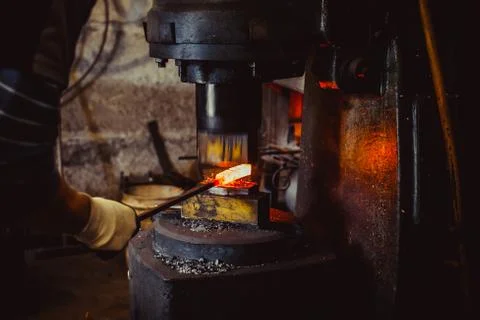 Hammer in the forge Stock Photos