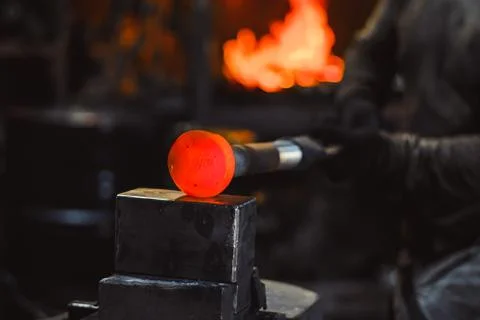Hammer in the forge Stock Photos