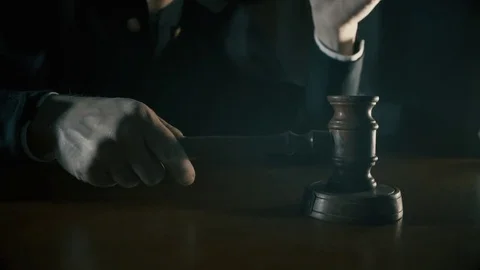 The hammer in the hand of the judge Stock Footage 75912906