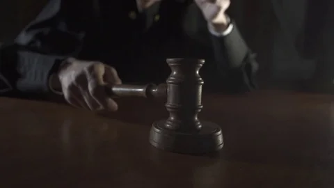 The hammer in the hand of the judge Stock Footage 75912909