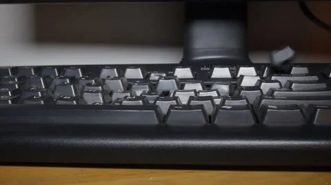 Hammer hits and destroys computer keyboard Stock Footage 55224753