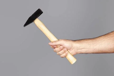 Hammer An image of a man holding a hammer Copyright: xZoonar.com/magannx 2... Stock Photos