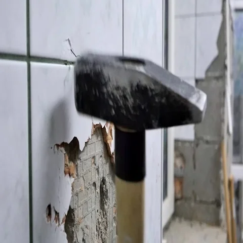 Hammer impact on ceramic tile Stock Footage 69280775