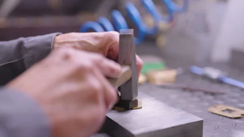 Hammer in a man's hand. metal processing Stock Footage 314380429