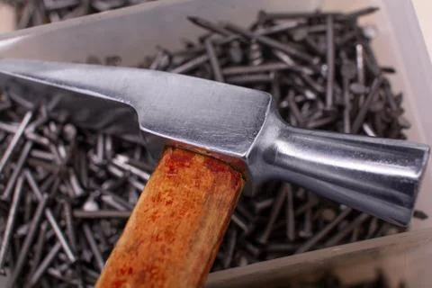 Hammer on nails close-up Foto stock