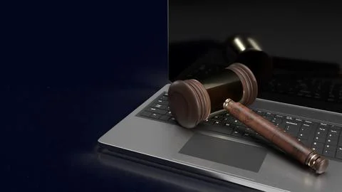 The hammer on notebook for law concept 3d rendering Illustrazione stock
