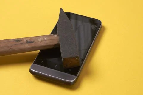 Hammer on the phone Stock Photos