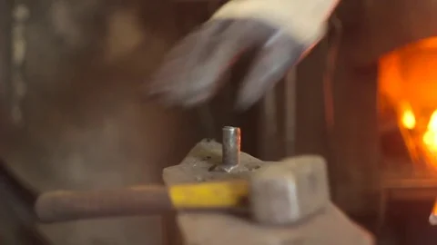 The hammer strikes the anvil Stock-Footage 75070552