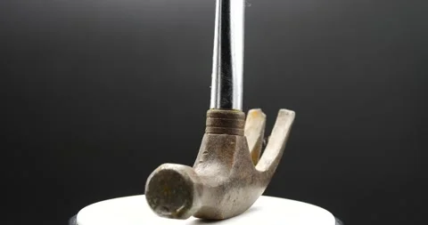 Hammer tool spinning isolated on black close up Stock Footage 169831732