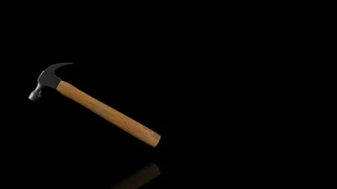 Hammer turns on itself - loop animation - black background Stock Footage 255461750