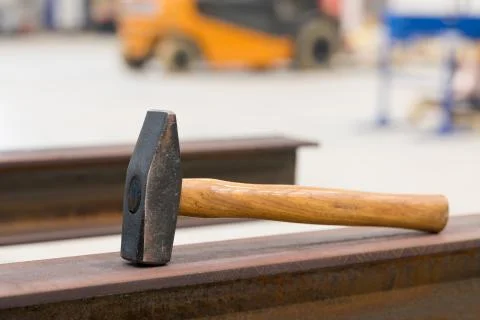 Hammer on working place Stock Photos