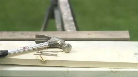 A hammer on a worktable Stock Footage 11286869