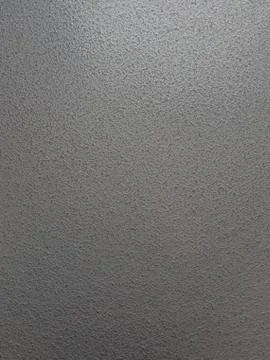 Hammered effect silver grey painted steel plate Stock Photos