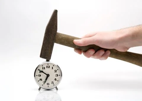 Hammering alarm-clock Stock Photos