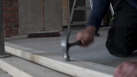 Hammering down a nail Stock Footage 313239355