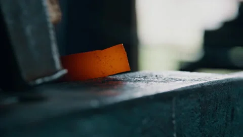 Hammering hot metal in the workshop Stock Footage 275449184