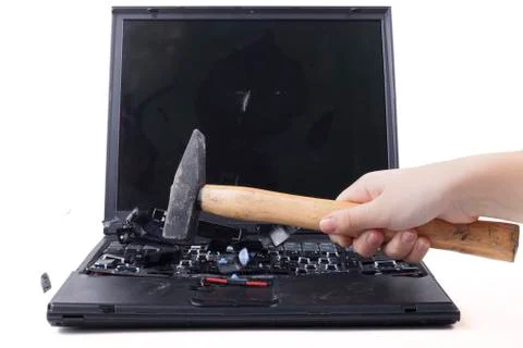 Hammering laptop Stock Photos
