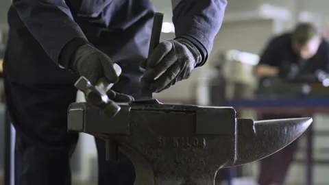 Hammering Piece of Metal Stock Footage 151427241
