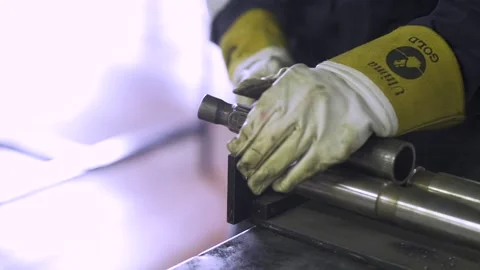 Hammering Pipe Stock Footage 151427222