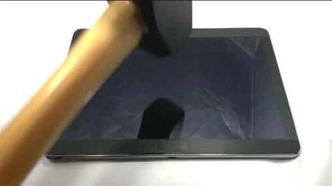 Hammering a Tablet Video stock 150268315