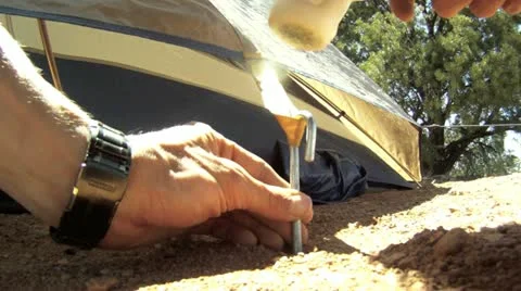 Hammering Tent Pegs In Stock Footage 11806010