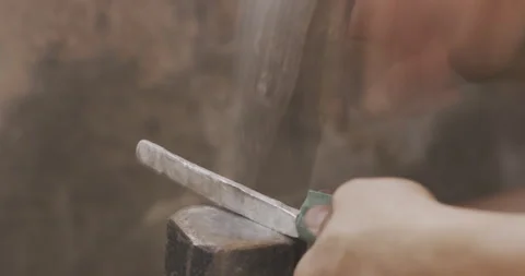 Hammering using Silver mark Stock Footage 141364832
