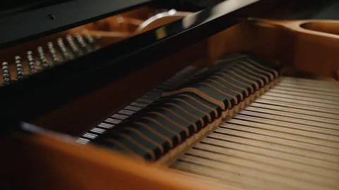 Hammers strike the piano strings Stock Footage 121050662